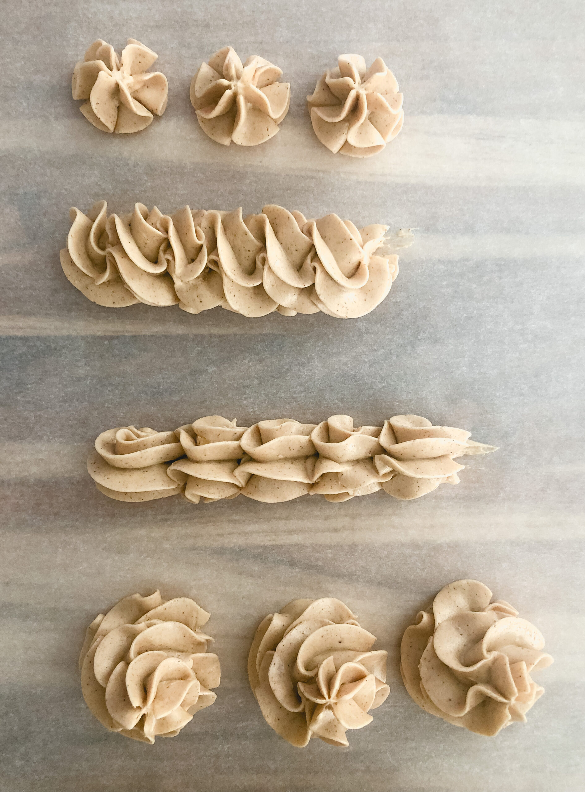 Swiss meringue buttercream icing pipped in different patterns