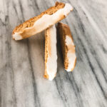 Gluten Free Lemon Meringue Biscotti on a marble table