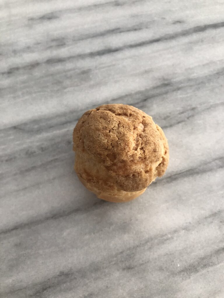Cream puff with craquelin on top. 